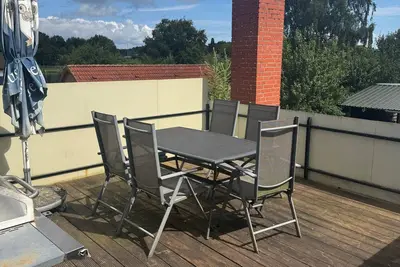 Image de Appartement 'FeWo 1 Dachterrasse' avec jardin commun et Wi-Fi
