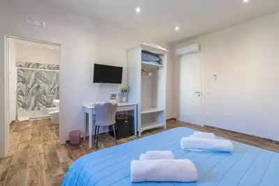 Image de Chambre 'Beb Della Stazione - Bleue' avec terrasse partagée, Wi-Fi et climatisation
