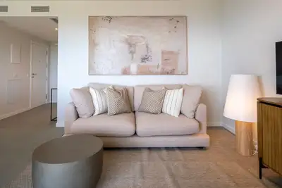 Image de Modern Costa Living: Sleek Three-Bedroom Apartment with Shared Pool & Fitness Center