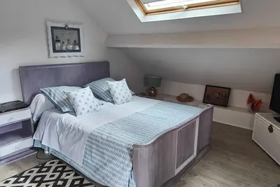 Image de Chambre d’hôtes « Chambre Orange » avec terrasse partagée, jardin partagé et Wi-Fi