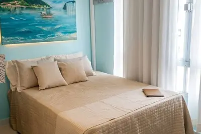 Image de Fully furnished apartment, beachfront building in Gonzaga | Garage | Wi-Fi | Sleeps 4