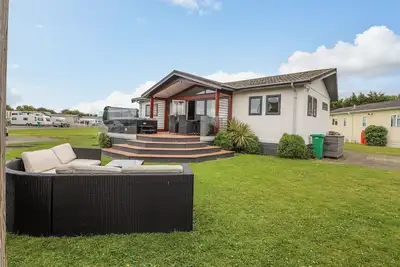 Image de Honeysuckle Lodge, pet friendly, with hot tub in Towyn
