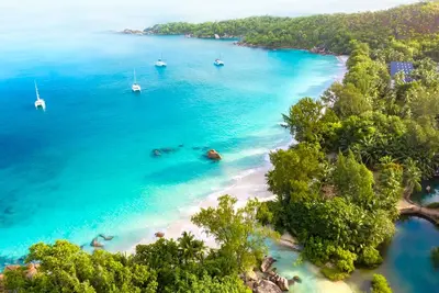 Image de Seychelles Sun-Soaked Sailing: A Pristine Beach Experience from Praslin