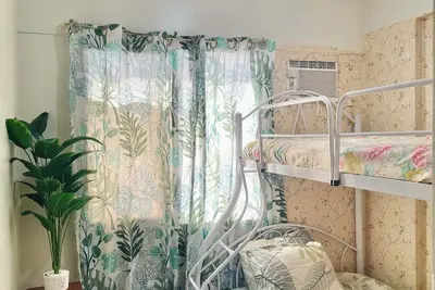 Image de 2-bedroom condo minutes away from Moa, Airports, Makati and Big Malls.