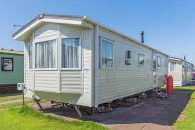 Image de Bronze 3 Bedroom Caravan, Sleeps 8.