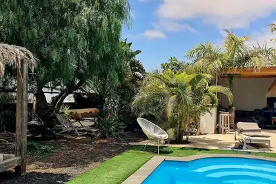 Image de \"OasisLajares\" maison de charme  avec piscine et jardin exotique à Lajares.