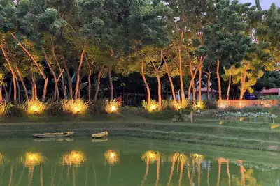Image de Luxury retreat in São Luís with lake, sports courts and lush nature.