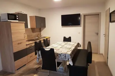 Image de Ferienwohnungen Specht - FeWo 3 Tangerhütte