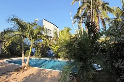 Image de Cozy beach house - 5 minute walk to the fabulous Playa San Blas 3 rooms with Ac