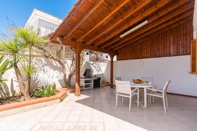 Image de Villa Nina à Torre dell'Orso avec terrasse privée, Wi-Fi, climatisation et barbecue