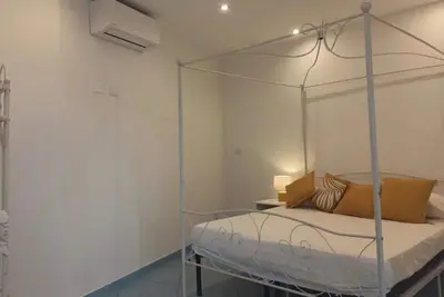 Image de Chambre « Villa Le Palette - Ginestre » avec vue mer, Wi-Fi et climatisation