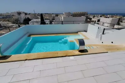 Image de Maison centre ville Hammamet roof top avec piscine 15 personnes
