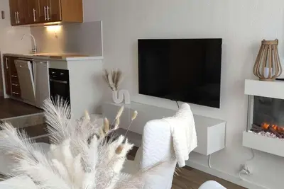 Image de À 20m des pistes de ski, 5ème étage, balcon, cheminée ou poêle à bois, télévision, casier à ski
