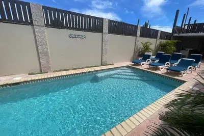 Puerta del Sol #4-studio-with shared pool- near airport- sleeps 4