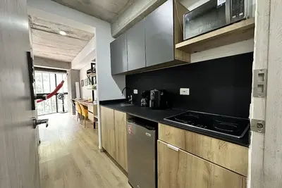 Image de Cozy and modern loft with jacuzzi, terrace, gym and incredible view of Cali.