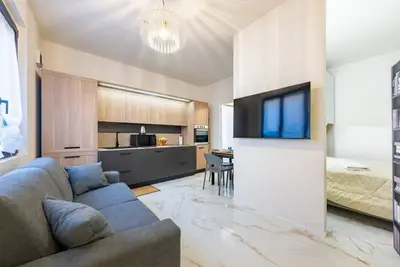Image de Modern 44 square meters studio apartment (with separate sleeping area), perfect for four people, located on the first floor of a recently renovated 1960s building with elevator (Not accessible to disabled guests). The property enjoys an excellent location