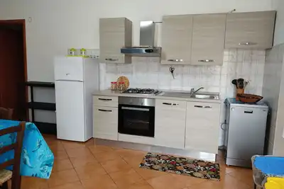 Image de Appartement 'Casa Delle Mimose Près de la Mer' avec Terrasse Privée, Wi-Fi et Climatisation