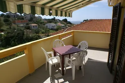 Image de Appartement d'une chambre avec la terrasse et la vue sur le mer Jakisnica, Pag (A-4053-a)