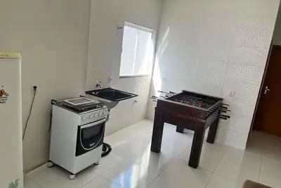 Image de Small house with pool and barbecue.