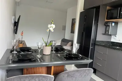 Image de Apartment in Ubatuba with pool, gourmet balcony with barbecue, split air conditioning, and gym.