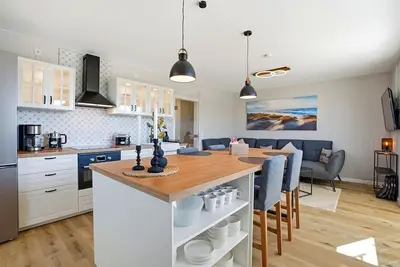 Image de Carina vacation apartment in Norddeich with balcony and Wlan for up to 4 people