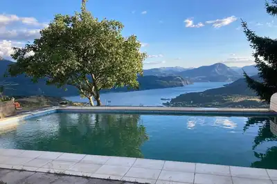 Image de Villa Morgon 160m² en 2 appartements, piscine, sauna, 5 chambres, sublime vue lac