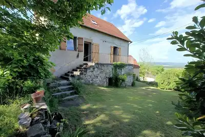 Image de Gîte « Le Salon » avec vue panoramique, jardin privé et balcon