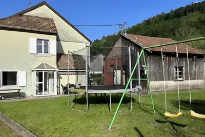 Image de Maison de vacances « Gîte Sur L’île » avec vue sur la montagne, terrasse privée et Wi-Fi