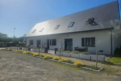 Image de Maison de vacances « Logement De Vacances T'chot Pierre » avec terrasse partagée, jardin partagé et Wi-Fi