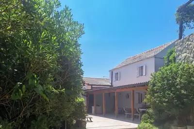 Image de Maison de vacances privée avec Wifi, climatisation, bain à remous, Tv, terrasse, animaux admis