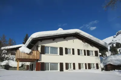 Image de Casa Mirella, (Flims Dorf). 4 Zimmerwohnung by Interhome