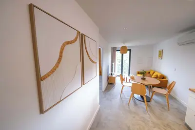 Image de Les Suites du Parc : Face au parc Simone Veil appartement d'exception, 2 chambres au coeur de la ville