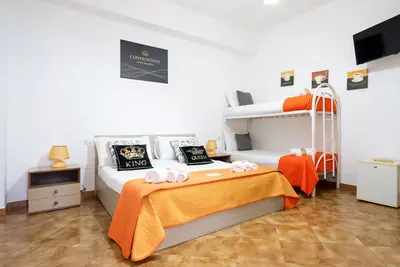 Image de Chambre quadruple avec salle de bain privée et climatisation