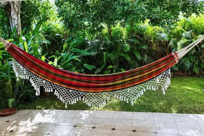 Image de Demi-villa cosy au cœur d’un jardin tropicale, à 10 min de l’aéroport