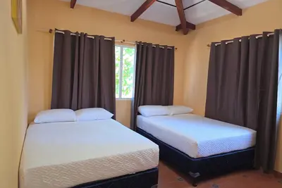 Image de Beach hotel and restaurant, with swimming pool, restaurant and bar.