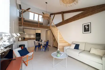 Image de L’atelier du coq gaulois : loft moderne et cosy en centre ville.