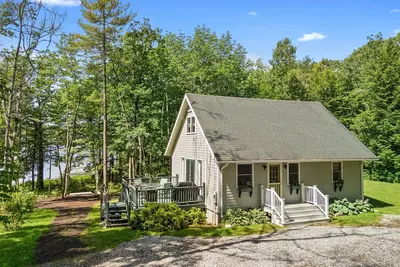 Image de Loon's Cry on South Pond- Sunny, lakefront home with private dock, great deck & firepit