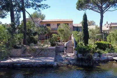 Image de Exceptionnel, Villa au bord du Lagon à Saint Cyprien à 2 pas de la plage.