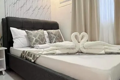 Image de Puerto Princesa Cozy 2br condo near Airport, Free Pool, Gym + Parking