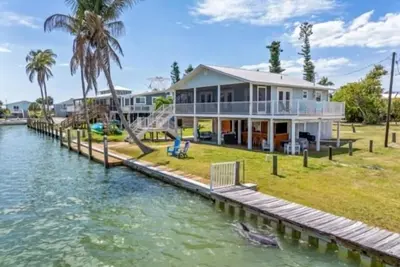 Image de Welcome to Waters Edge, a true hidden gem on Little Gasparilla Island-where turquoise water, gentle breezes, and total relaxation replace traffic, noise, and stress