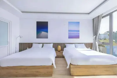 Image de Welcome to Q's House, only 3 mins walk to My Khe Beach. This is a 40 sqm studio
