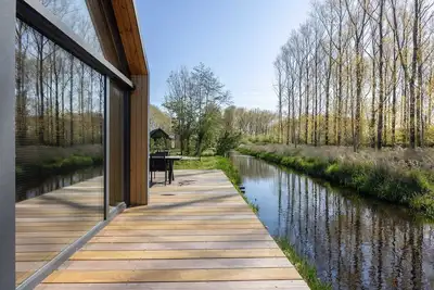 Image de Tiny house by the water in Oud Ade | Tuin van Keet - 25