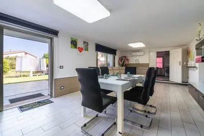 Image de MomoLea Holiday Home – Appartement spacieux au cœur de Sarroch, idéal pour 4 personnes