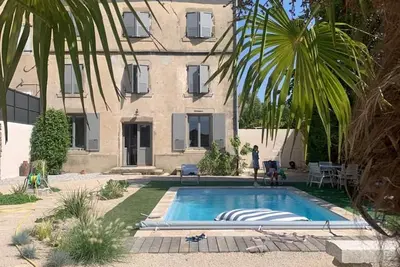 Image de Maison de vacances « La Maison des Remparts » avec piscine privée, Wi-Fi et climatisation