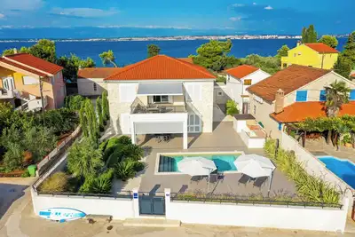 Image de Villa Olive Bay Dream house on the Croatian island of Ugljan. Pool and boat mooring