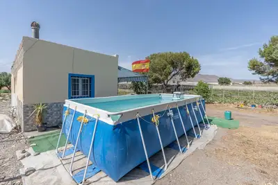 Image de Maison de vacances 'Cortijo Idéal pour Familles' avec piscine privée, terrasse et jardin