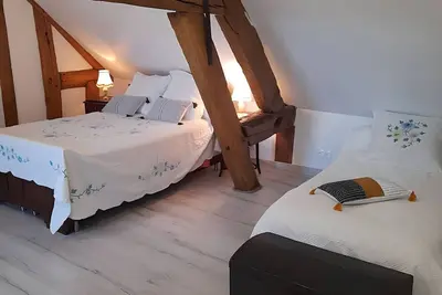 Image de Chambre d’hôtes « Chambre 2 » avec piscine partagée, terrasse commune et Wi-Fi