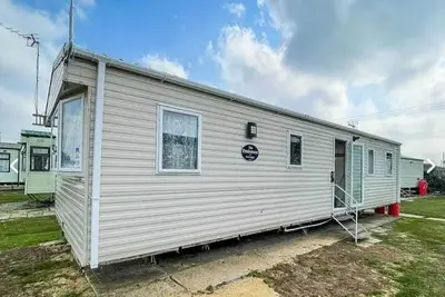 Image de Beachfront 3-Bed Caravan- Pool, Bar & Beach Steps Away