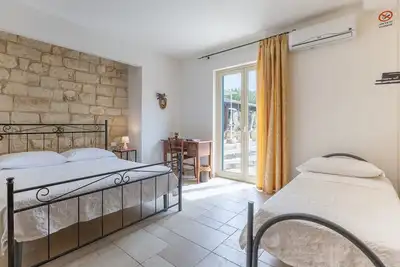 Image de Maison d’hôtes « Alla Corte Di Nonna Maria » avec climatisation