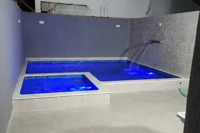 Image de Beach house with pool and hot tub: A retreat to relax with the family!